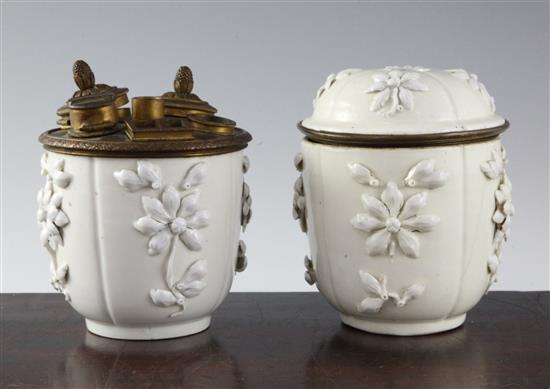 A pair of Saint-Cloud porcelain pots and one cover, mid 18th century height 11.5cm (4.5in.)